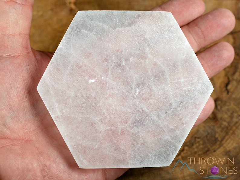 These are white Selenite crystal carved polished hexagon plates.
Crystals are nature-made therefore each one is unique in appearance.