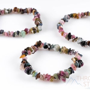 Handcrafted Tourmaline chip bracelet. These rainbow colored tumbled stones are drilled and strung on an elastic cord, to create an endless bracelet. Each crystal bracelet is unique in color, and has a wrist circumference of approximately 6 inches.