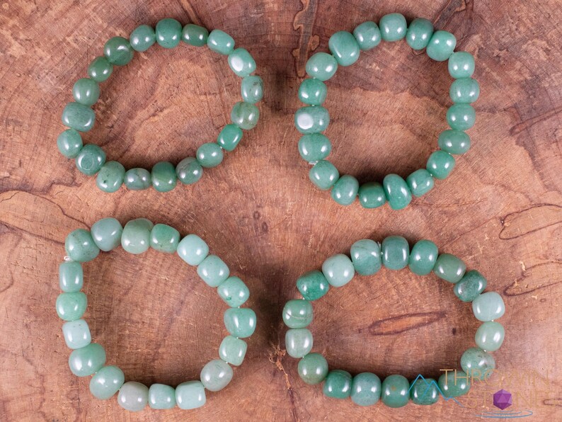 These pale Green Aventurine crystal bracelets have tumbled beads strung on elastic for an endless bracelet.  
Crystals are nature-made therefore each one is unique in appearance.