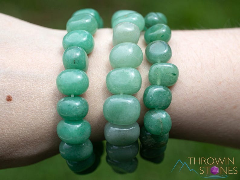 These pale Green Aventurine crystal bracelets have tumbled beads strung on elastic for an endless bracelet.  
Crystals are nature-made therefore each one is unique in appearance.