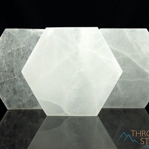 These are white Selenite crystal carved polished hexagon plates.
Crystals are nature-made therefore each one is unique in appearance.