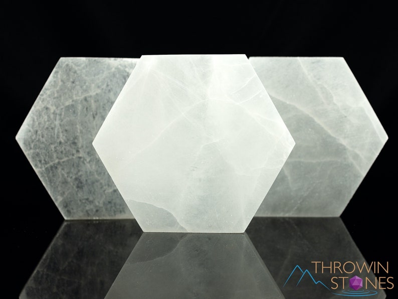 These are white Selenite crystal carved polished hexagon plates.
Crystals are nature-made therefore each one is unique in appearance.