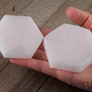 These are white Selenite crystal carved polished hexagon plates.
Crystals are nature-made therefore each one is unique in appearance.