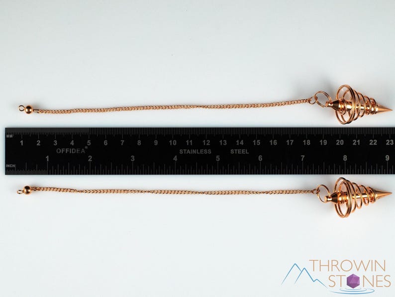 These copper pendulums are wire spirals with a pointed tip, with a copper chain and bead.