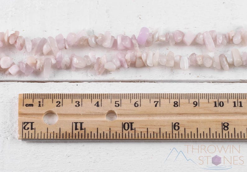 These pale pink Kunzite crystal necklaces have crystal chip beads strung on beading cord for an endless necklace. 
Crystals are nature-made therefore each one is unique in appearance.