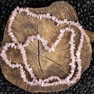 These pale pink Kunzite crystal necklaces have crystal chip beads strung on beading cord for an endless necklace. 
Crystals are nature-made therefore each one is unique in appearance.
