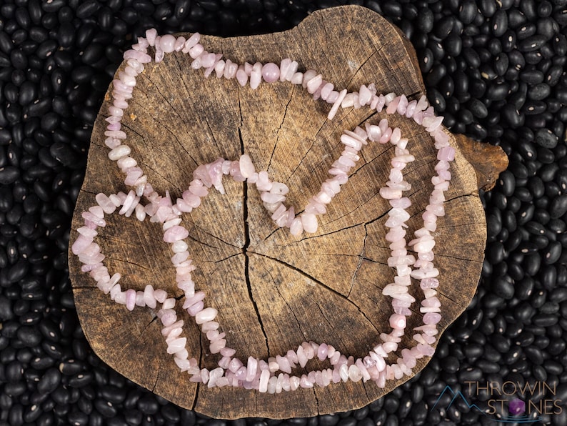 These pale pink Kunzite crystal necklaces have crystal chip beads strung on beading cord for an endless necklace. 
Crystals are nature-made therefore each one is unique in appearance.