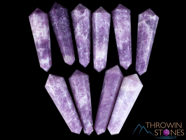 These Lepidolite crystal carved polished double terminated points range in a variety of handheld sizes.  Lepidolite  is mottled light to dark pinkish purple with white splotches.
Crystals are nature-made therefore each one is unique in appearance.