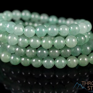 These pastel green Aventurine crystal bracelets have sphere beads strung on elastic for an endless bracelet. 
Crystals are nature-made therefore each one is unique in appearance.