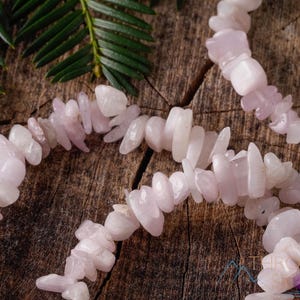 These pale pink Kunzite crystal bracelets have chip beads strung on elastic for an endless bracelet.  
Crystals are nature-made therefore each one is unique in appearance.