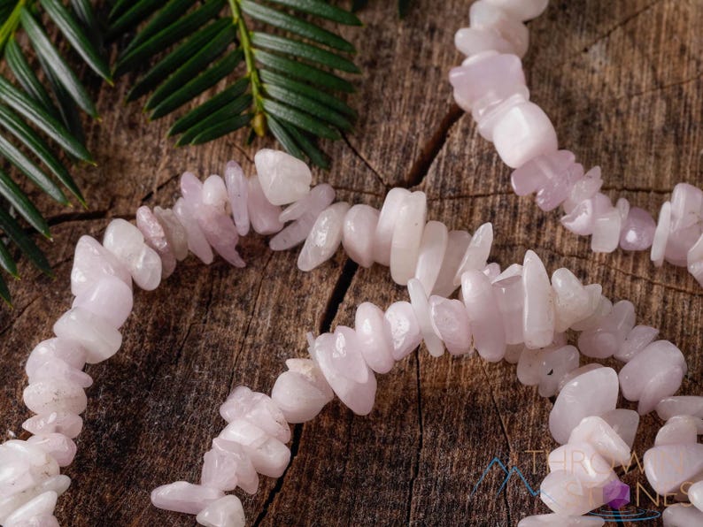 These pale pink Kunzite crystal bracelets have chip beads strung on elastic for an endless bracelet.  
Crystals are nature-made therefore each one is unique in appearance.