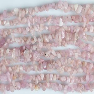 These pale pink Kunzite crystal necklaces have crystal chip beads strung on beading cord for an endless necklace. 
Crystals are nature-made therefore each one is unique in appearance.