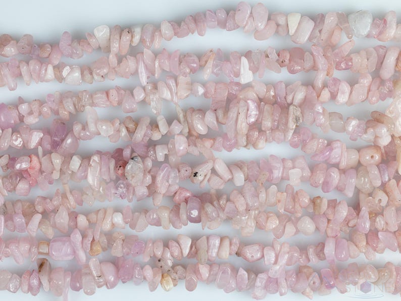 These pale pink Kunzite crystal necklaces have crystal chip beads strung on beading cord for an endless necklace. 
Crystals are nature-made therefore each one is unique in appearance.
