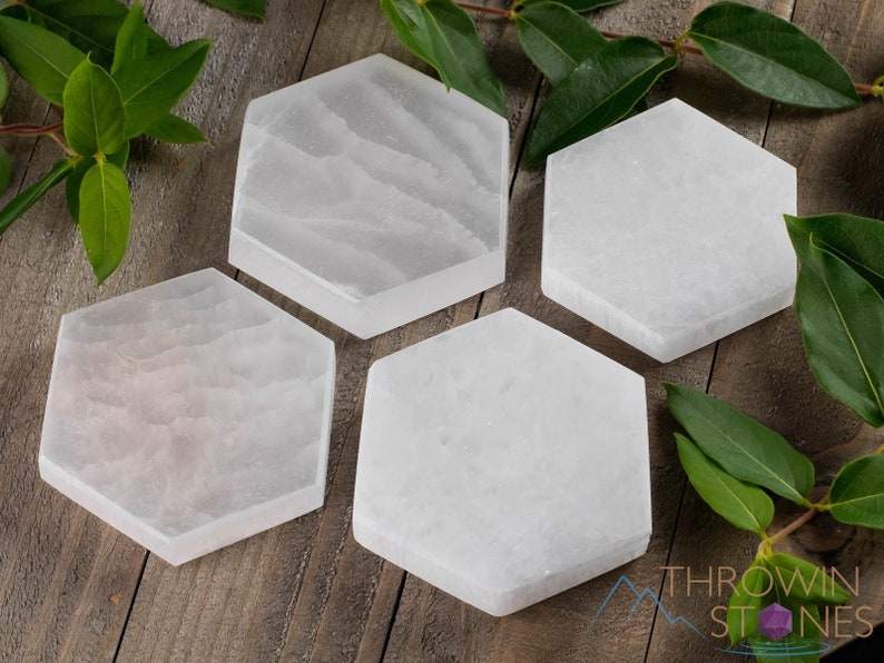 These are white Selenite crystal carved polished hexagon plates.
Crystals are nature-made therefore each one is unique in appearance.