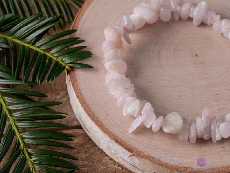 These pale pink Kunzite crystal bracelets have chip beads strung on elastic for an endless bracelet.  
Crystals are nature-made therefore each one is unique in appearance.