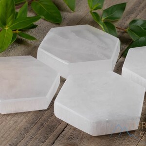 These are white Selenite crystal carved polished hexagon plates.
Crystals are nature-made therefore each one is unique in appearance.