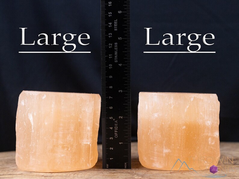 These peachy orange Selenite crystal carved raw cylindrical votive candle holders range in a variety of sizes.  
Crystals are nature-made therefore each one is unique in appearance.
