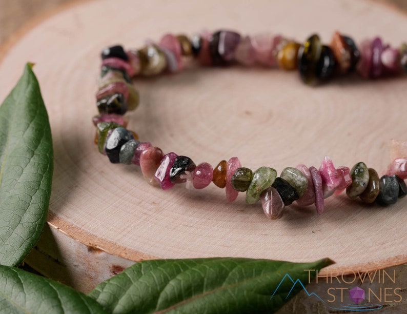 Handcrafted Tourmaline chip bracelet. These rainbow colored tumbled stones are drilled and strung on an elastic cord, to create an endless bracelet. Each crystal bracelet is unique in color, and has a wrist circumference of approximately 6 inches.