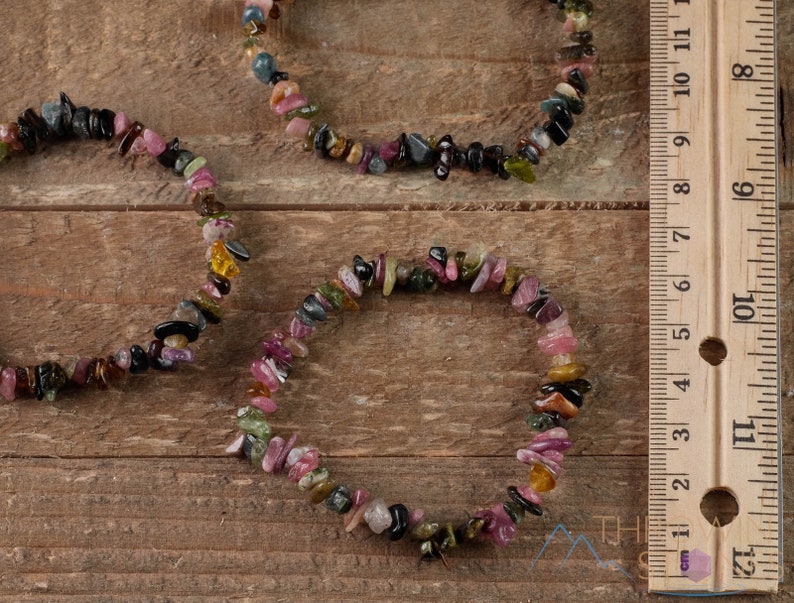 Handcrafted Tourmaline chip bracelet. These rainbow colored tumbled stones are drilled and strung on an elastic cord, to create an endless bracelet. Each crystal bracelet is unique in color, and has a wrist circumference of approximately 6 inches.