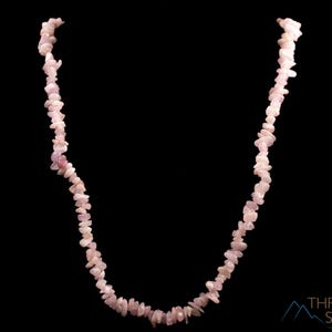 These pale pink Kunzite crystal necklaces have crystal chip beads strung on beading cord for an endless necklace. 
Crystals are nature-made therefore each one is unique in appearance.