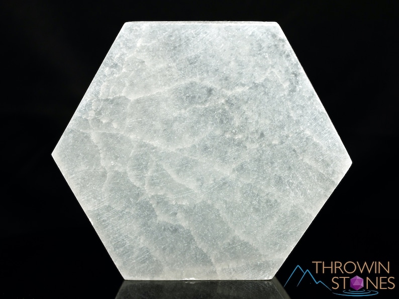 These are white Selenite crystal carved polished hexagon plates.
Crystals are nature-made therefore each one is unique in appearance.