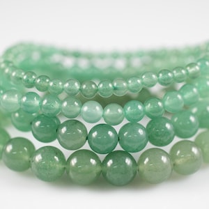 These pastel green Aventurine crystal bracelets have sphere beads strung on elastic for an endless bracelet. 
Crystals are nature-made therefore each one is unique in appearance.