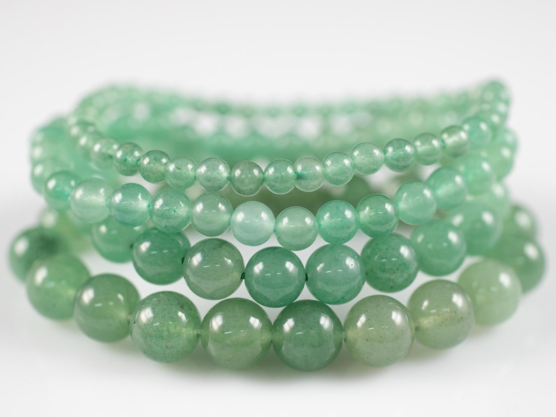 These pastel green Aventurine crystal bracelets have sphere beads strung on elastic for an endless bracelet. 
Crystals are nature-made therefore each one is unique in appearance.