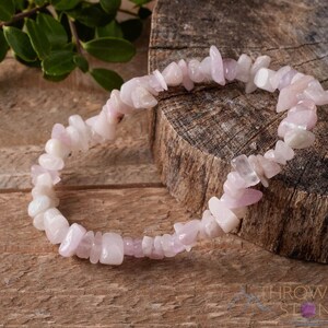 These pale pink Kunzite crystal bracelets have chip beads strung on elastic for an endless bracelet.  
Crystals are nature-made therefore each one is unique in appearance.