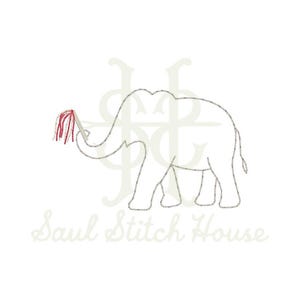 May include: An embroidery design featuring a light gray outline of an elephant holding a red fringed wand in its trunk. The background displays a faint, large monogram logo and the text Saul Stitch House in a light script font at the bottom.
