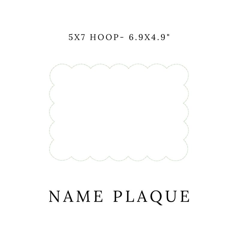 May include: A white, scalloped-edge name plaque. The text "5X7 HOOP - 6.9X4.9" is at the top, and "NAME PLAQUE" is at the bottom. The plaque is designed for embroidery or personalization.