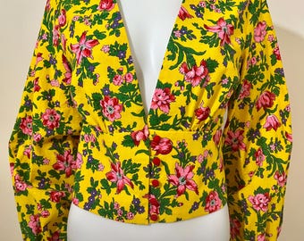 Blusa floreale scollatura profonda