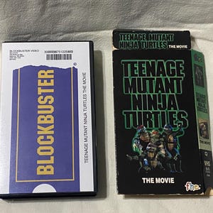 May include: A set of three ceramic mugs with a speckled, matte finish. The mugs are in shades of cream, light gray, and dark gray. Each mug has a simple, minimalist design and a rounded handle.