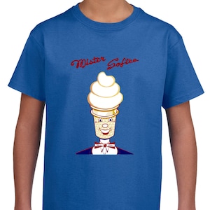 May include: Blue t-shirt featuring a cartoon ice cream cone character with a white swirl of ice cream and a smiling face. The text "Mister Softee" is written in red script above the character.