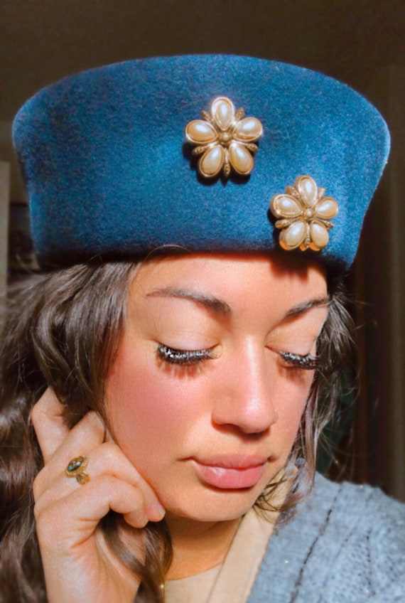 Navy pillbox hat with floral pearl detail - image 1