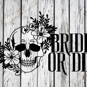 May include: Black and white graphic design of a skull with floral accents and the text "Bride or Die".