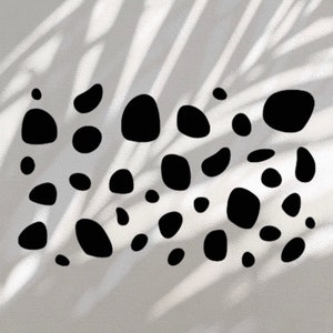 Pode incluir: Padrão abstrato preto e branco de pontos de vários tamanhos e formas sobre um fundo branco.