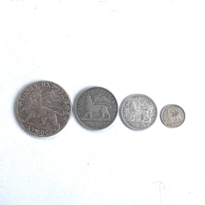 Moneda etíope. Colección de monedas de plata del emperador Menelik León de Judá. Moneda antigua, Moneda etíope, Birr etíope, Moneda etíope.