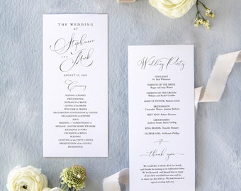 Peut inclure: Un programme de cérémonie de mariage avec un fond blanc et du texte noir. Le programme liste l'ordre des événements de la cérémonie, y compris la mise en place des familles, la procession, l'entrée de la mariée, la remise de la mariée, l'accueil et la prière, la déclaration d'intention du couple, la déclaration de soutien, le solo, la lecture, le message, l'échange des vœux, l'échange des alliances, la bénédiction, l'allumage de la bougie d'unité, la présentation du couple et la sortie. Le programme comprend également une liste de la fête de mariage avec les noms de l'officiant, des parents de la mariée, des parents du marié, de la demoiselle d'honneur, des demoiselles d'honneur, du témoin, des garçons d'honneur, du porteur d'alliances et de la demoiselle d'honneur.