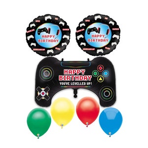 May include: A set of black and blue gamer themed party balloons with the text "Happy Birthday You've Levelled Up!" and a set of four solid color balloons in green, yellow, red, and blue.