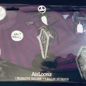 May include: A 64-inch inflatable balloon featuring Jack Skellington from The Nightmare Before Christmas. The balloon is silver and black and has a 30th anniversary logo.
