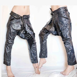 Asymmetric harem jeans, patchwork, raw denim, sarouel, plastic coated, distressed, torn, cropped, punk, avant garde, streetwear, hip hop,