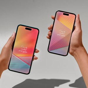 May include: Two smartphones with colorful abstract backgrounds and the text "Even the smallest spark ignites." displayed on the screen.