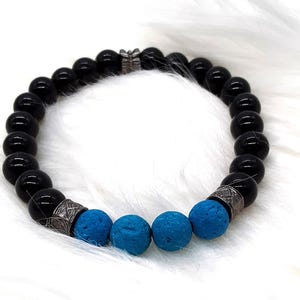 Pulsera de cuentas de vidrio negro y lava azul hecha a mano - Difusor de aromaterapia