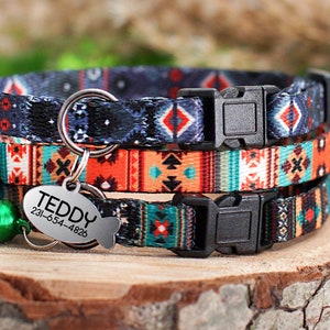 May include: A set of three colorful cat collars with a geometric pattern. The collars have a black buckle and a silver tag that reads "TEDDY 231-654-4826".