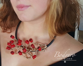 Jewel sculpture with branch and rose berries. Rubber choker with Microfusion branch and glass beads. Art to Wear