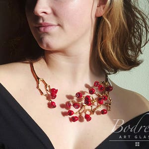 Jewel sculpture with branch and rose berries. Rigid microcast choker and glass beads. Art to Wear