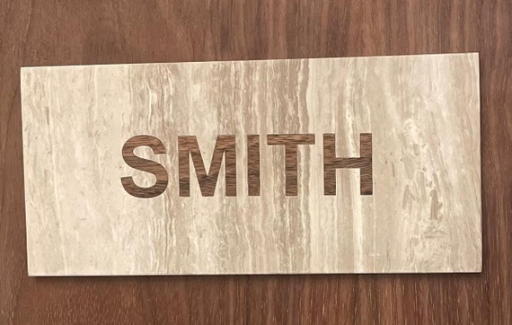 travertine door sign with walnut wood inlays
