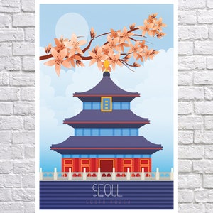 May include: A colorful illustration of a pagoda with a blue roof and red trim, surrounded by pink cherry blossoms. The text "SEOUL" and "SOUTH KOREA" is at the bottom of the image.