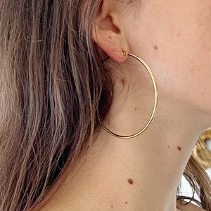 Thin gold hoop earrings, minimalist golden hoops, creole earrings made in stainless steel, statement hoops.