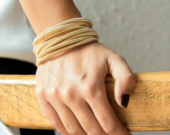 Metal spring bracelet, glossy golden guitar string bracelet, multi bangles, spring coil bangles, tubogas bracelet, bobina bangle.